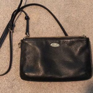 Never used black coach bag with gold hardware.